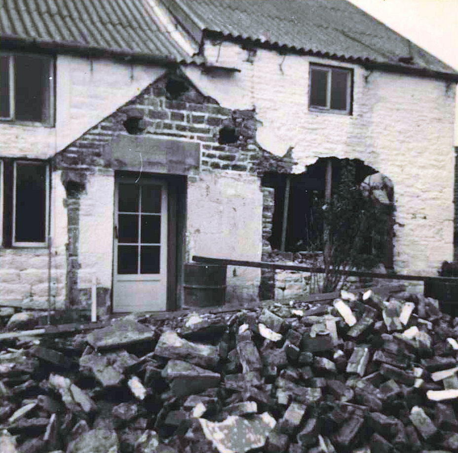 Datestone in situ above door at Cowden