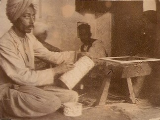 Ivory carver at work in India