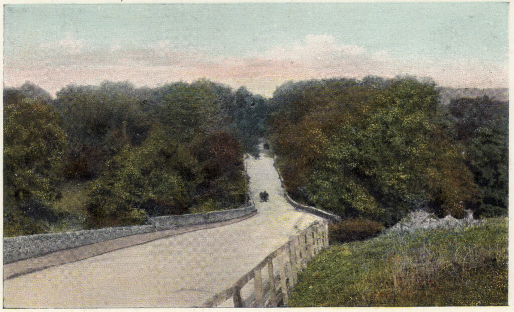 Postcard of cock bridge showing rooftop of Lower Cock Farm