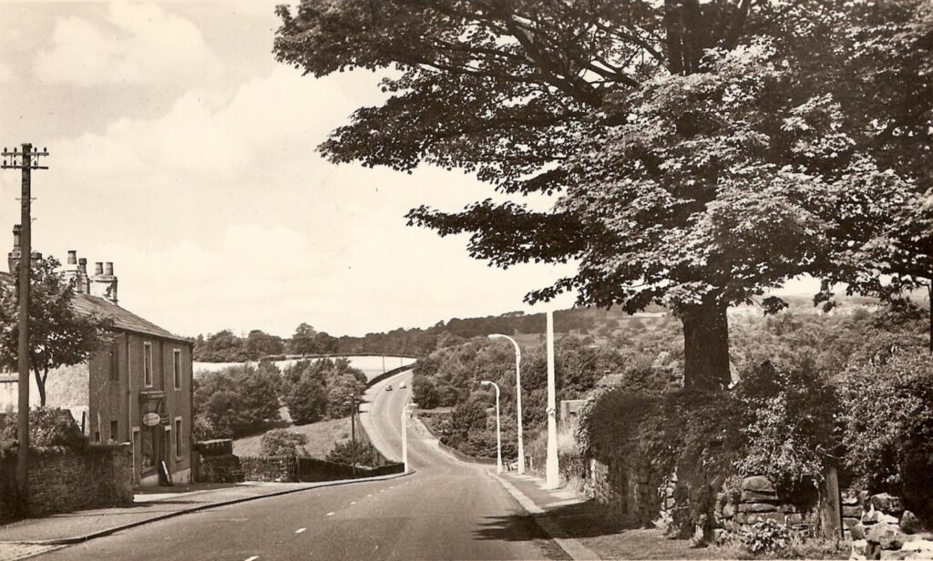 View of Whalley Road showing the WWII pill box on the right
